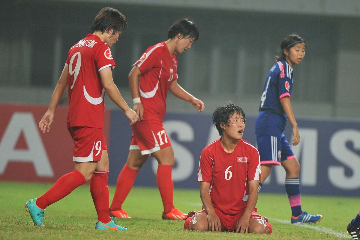 东亚杯-补时险失球中国女足雨战0-0日本队无缘冠军